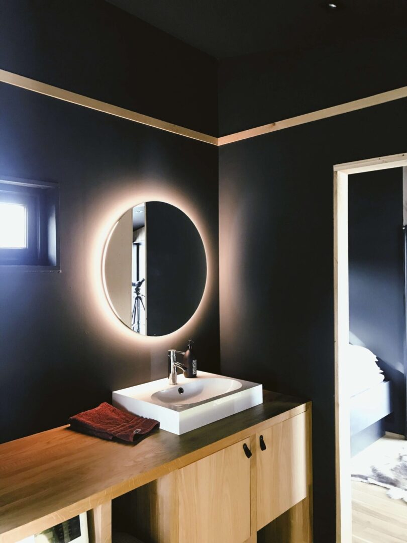 Glowing mirror in bathroom image
